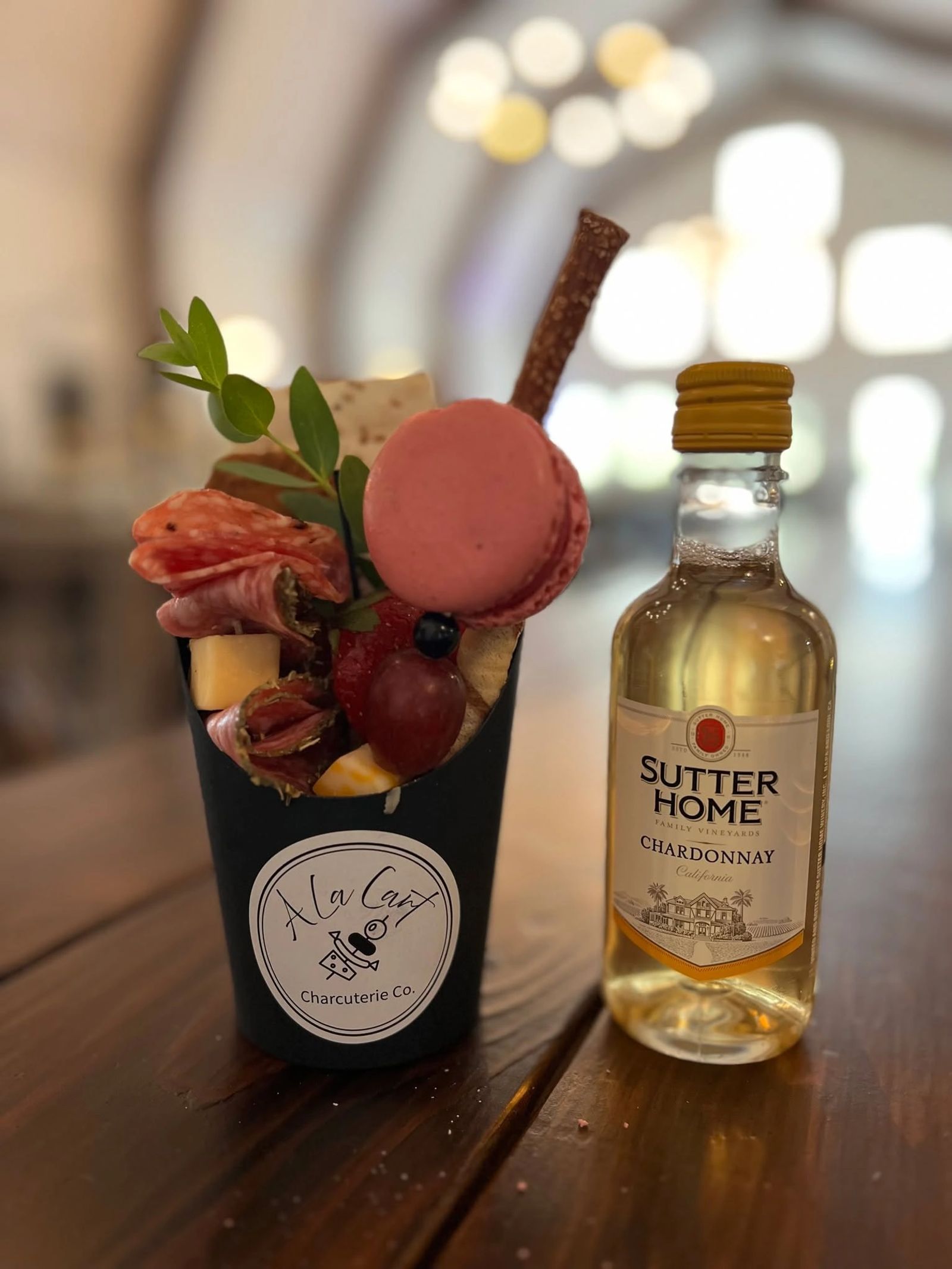 Charcuterie cup and wine