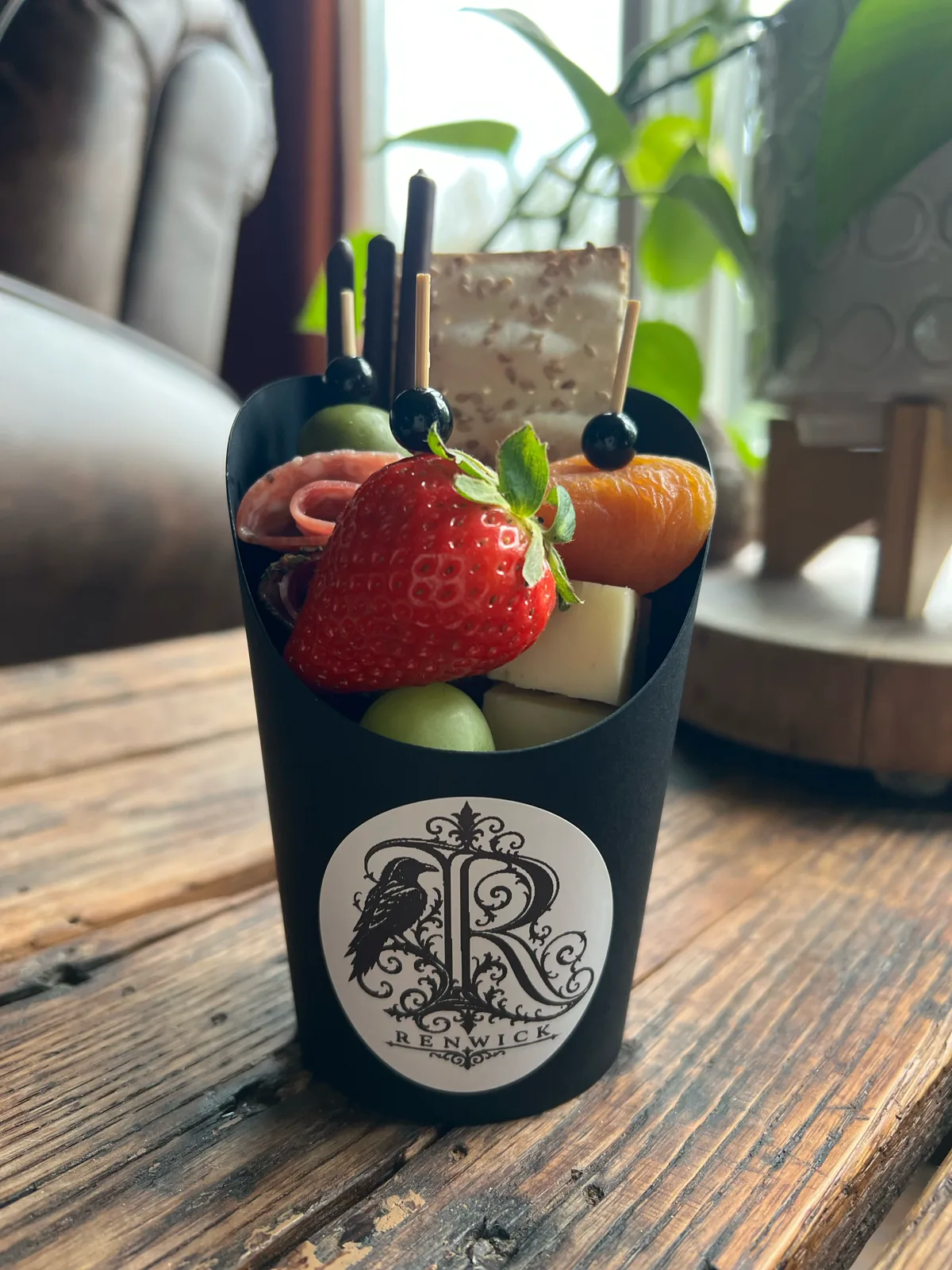 Bridal-shower charcuterie cup with a personalized sticker