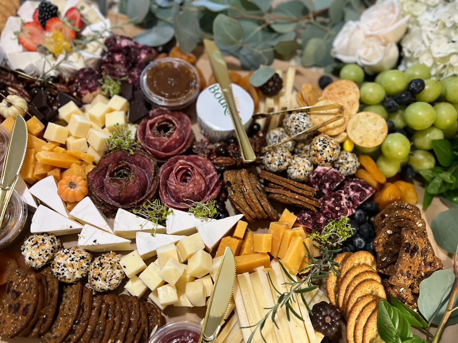 Custom wedding-morning grazing spread with charcuterie, cheeses, fruit, and crackers